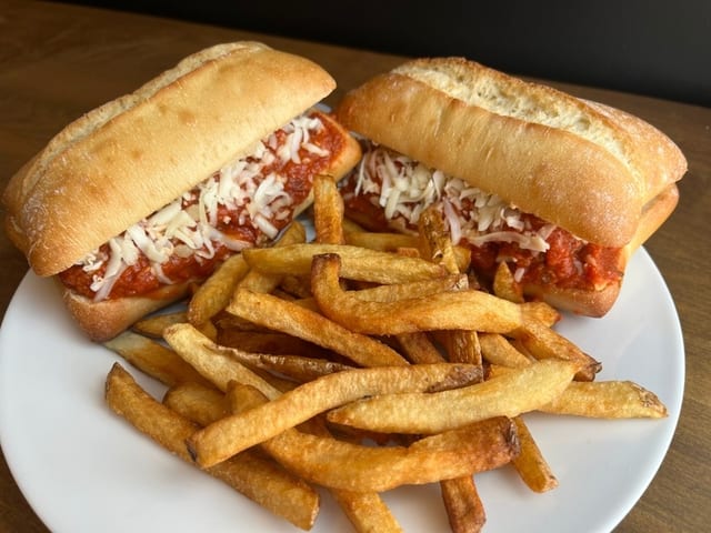 2 Meatball Sandwiches & Fries.